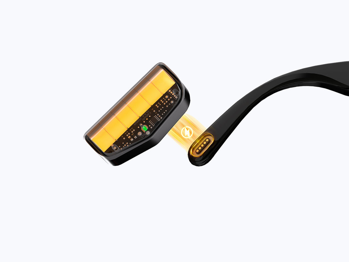 Illustration showing a Rokid Power Capsule battery aligned with charging contacts on a glasses arm