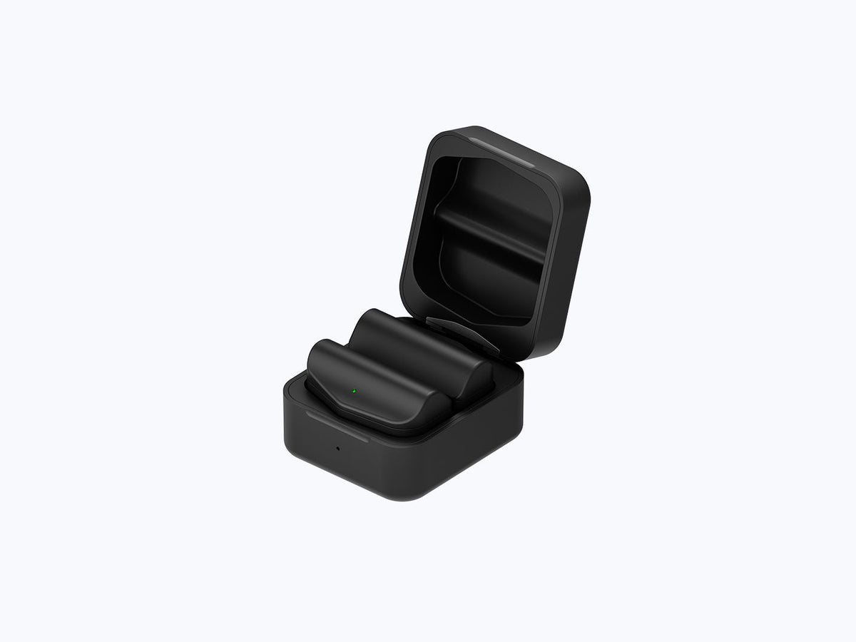 Two Rokid Power Capsule batteries in their open compact charging box